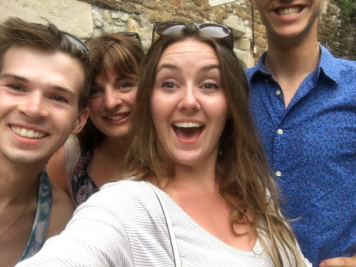 group selfie pose outdoors co-ed