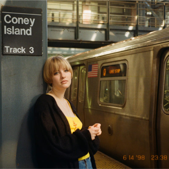 A woman at a train station