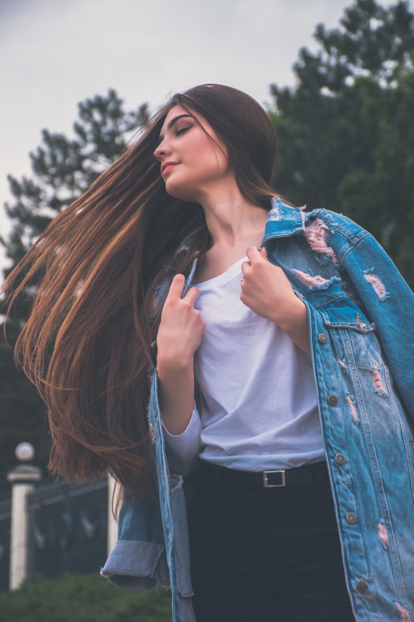 A woman wearing a top.