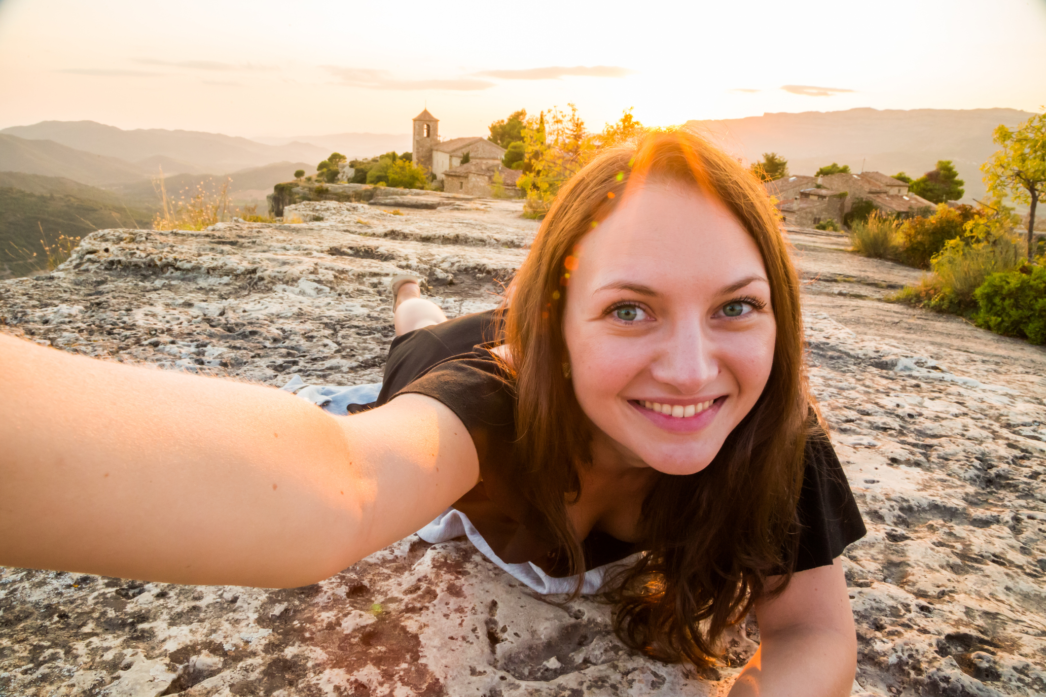 creative selfie idea outdoors woman camera mountain