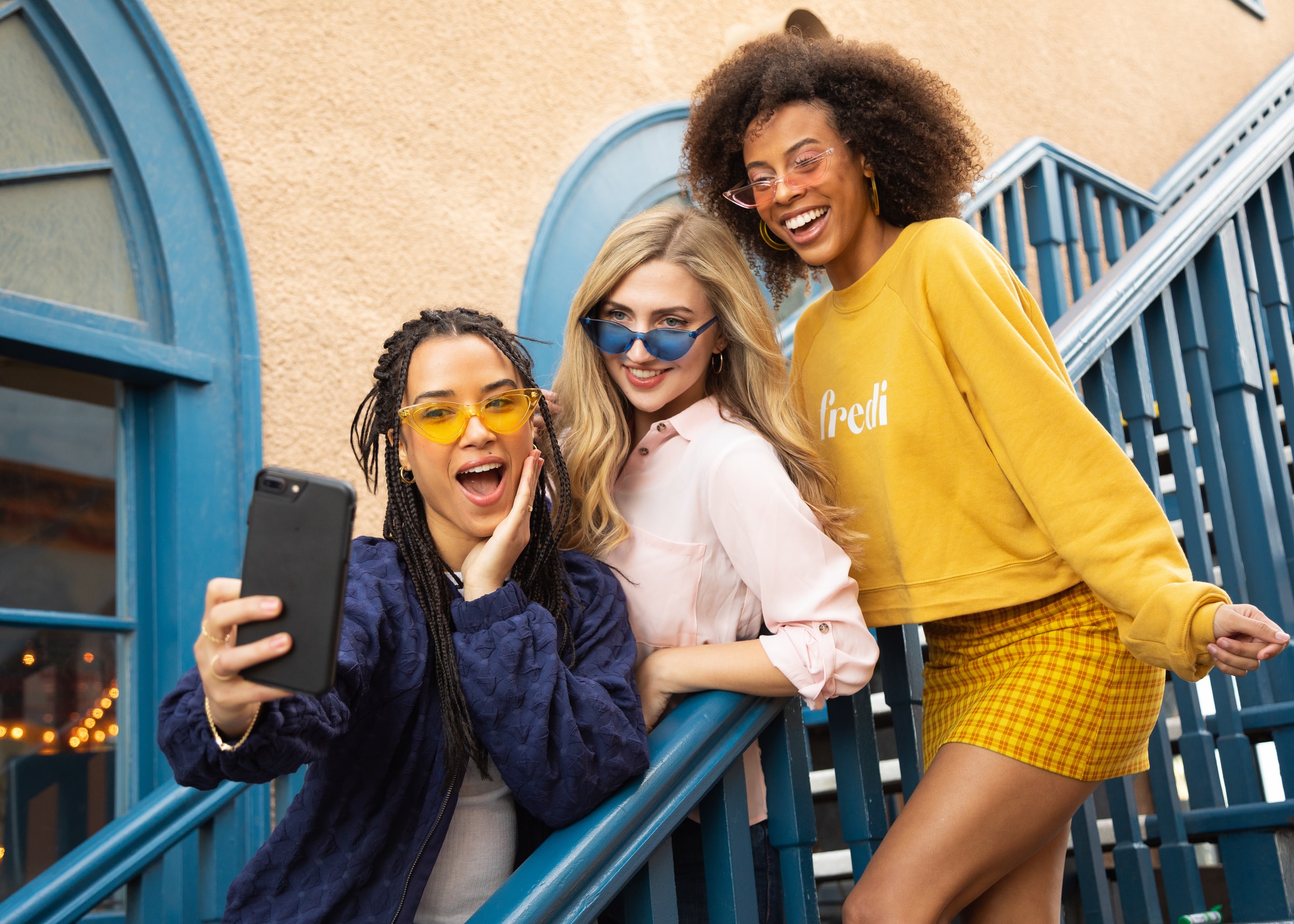 Three beautiful girls taking a selfie