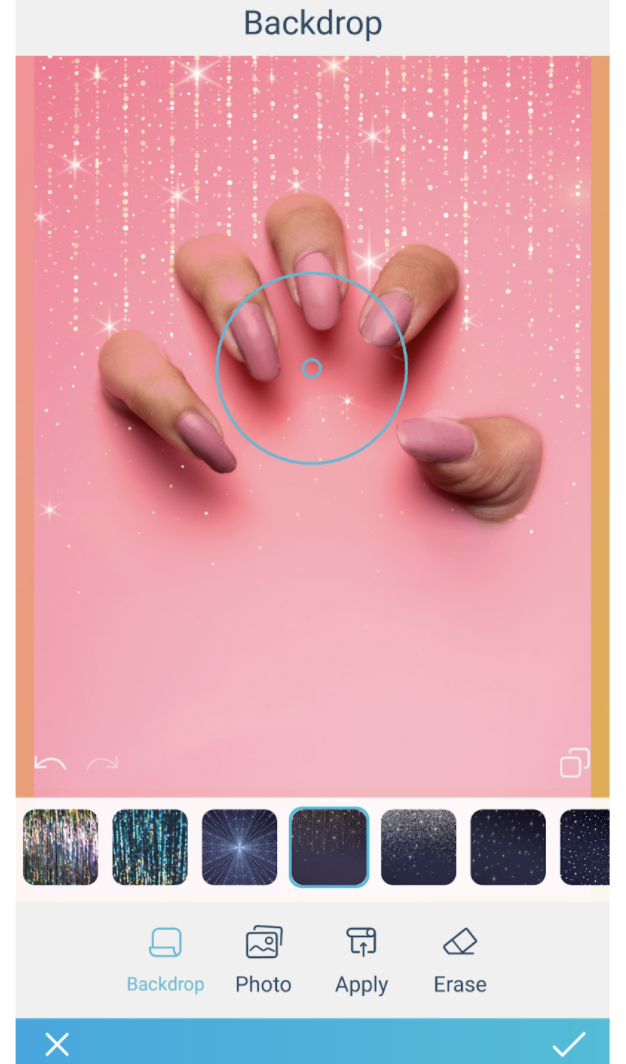 Palm on pink nail polish on a sparkling pink background